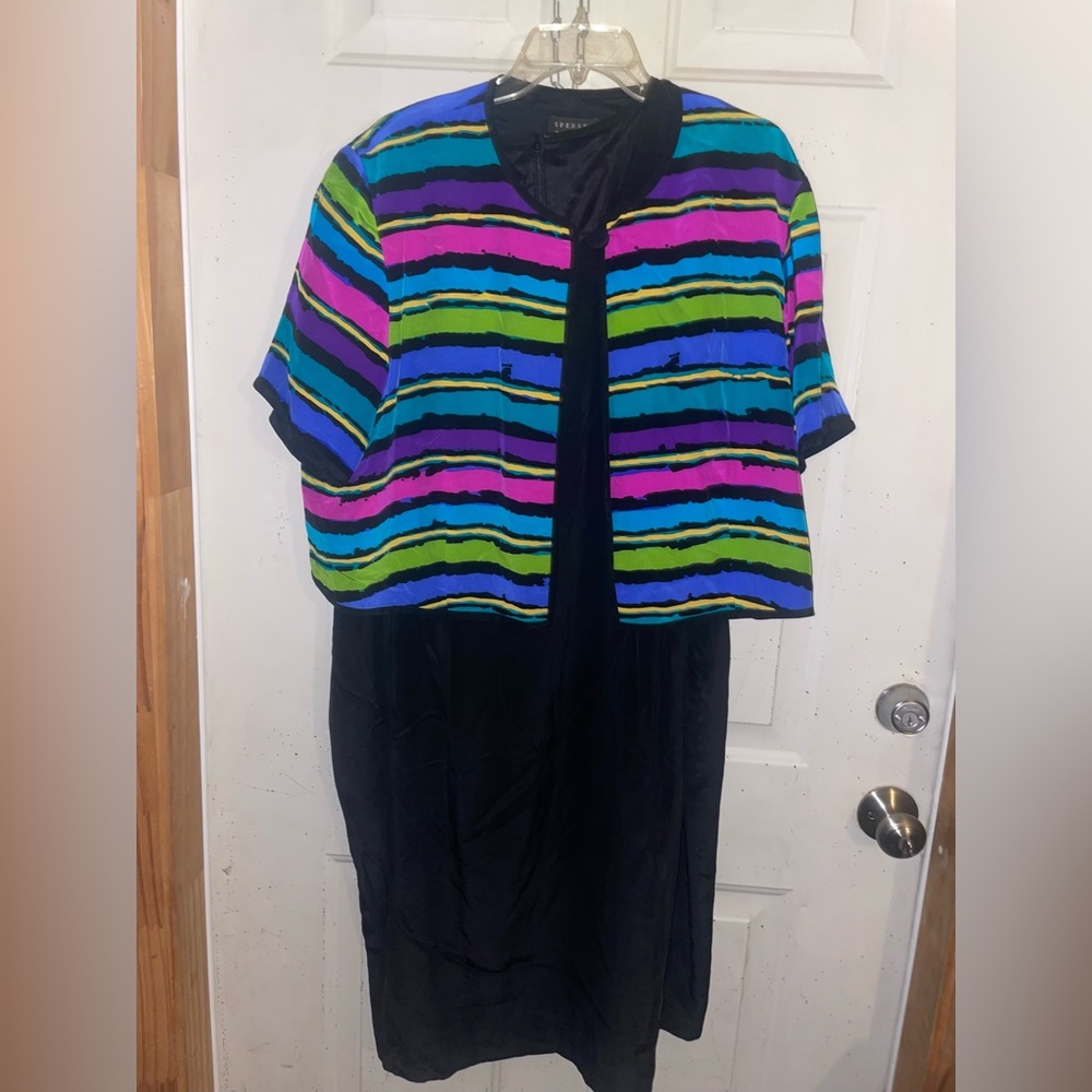Jeremy Spencer black dress and multi colored cover